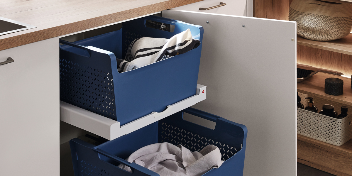 De moderne versie van de wasruimte overtuigt door een perfecte en functionele planning en een doordacht organisatiesysteem. Slimme details, zoals de opklapbare wasdroger, zijn echte dagelijkse hulpjes.